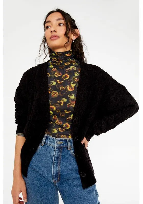 Cardigan de punto con botones y detalle de ochos negro - ECRU