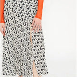 Falda midi evasé de crepe con abertura lateral y estampado abstracto - ECRU