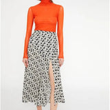 Falda midi evasé de crepe con abertura lateral y estampado abstracto - ECRU