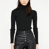 Jersey ajustado de punto canalé con cuello alto y manga larga negro - ECRU