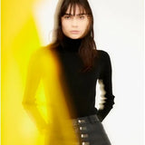 Jersey ajustado de punto canalé con cuello alto y manga larga negro - ECRU