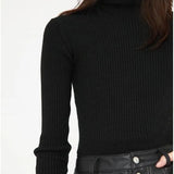 Jersey ajustado de punto canalé con cuello alto y manga larga negro - ECRU