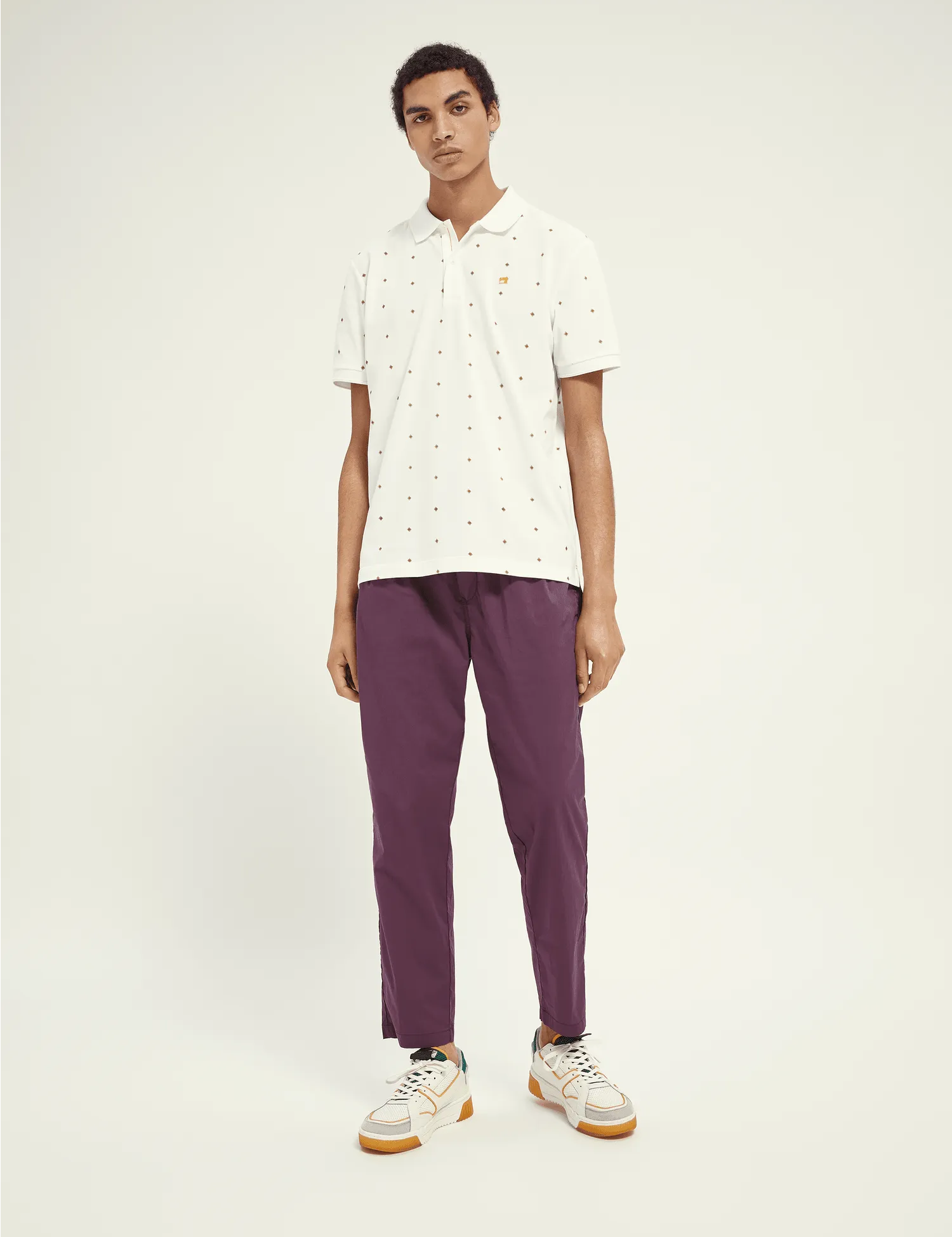 Polo de piqué de algodón orgánico con diseño estampado - ECRU