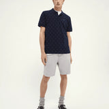 Polo de piqué de algodón orgánico con diseño estampado - ECRU