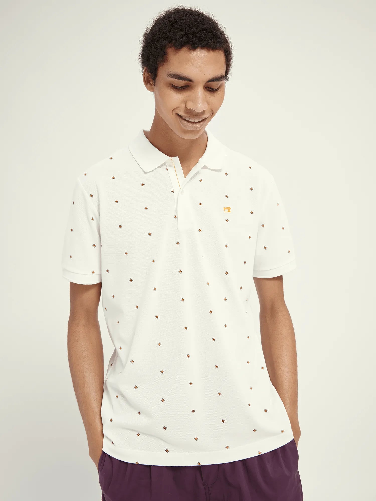 Polo de piqué de algodón orgánico con diseño estampado - ECRU