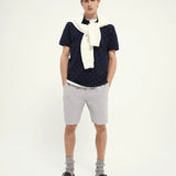 Polo de piqué de algodón orgánico con diseño estampado - ECRU