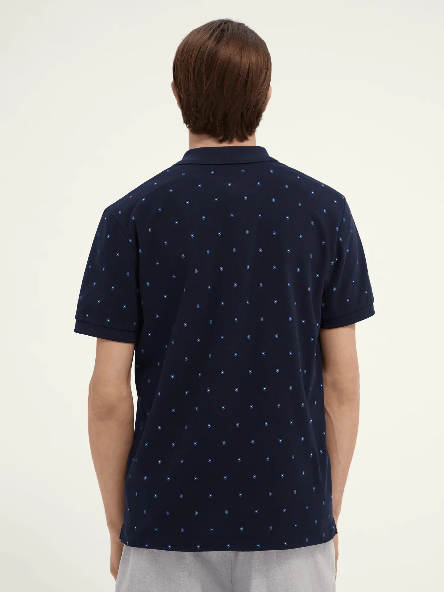 Polo de piqué de algodón orgánico con diseño estampado - ECRU