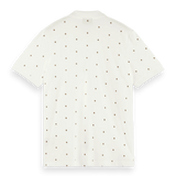 Polo de piqué de algodón orgánico con diseño estampado - ECRU