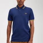 Polo Fred Perry M3600 Azul marino francés Hora dorada - ECRU