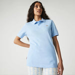 Polo unisex Lacoste L!VE relaxed fit en piqué de algodón stretch - ECRU