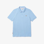 Polo unisex Lacoste L!VE relaxed fit en piqué de algodón stretch - ECRU