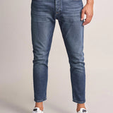 VAQUEROS KARL LOOSE SLIM CON DESGASTE - ECRU