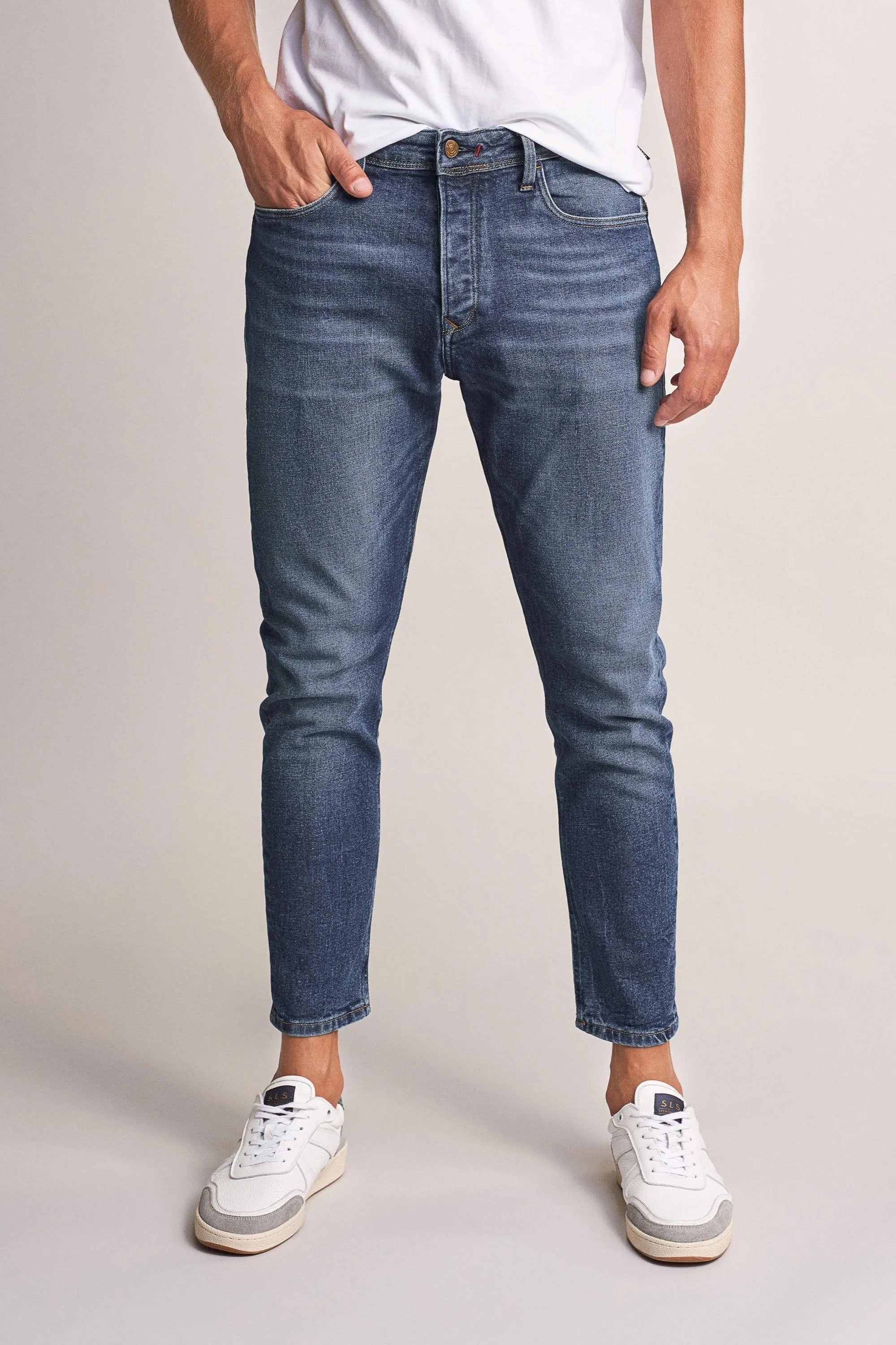 VAQUEROS KARL LOOSE SLIM CON DESGASTE - ECRU
