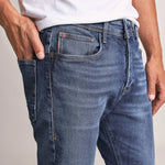 VAQUEROS KARL LOOSE SLIM CON DESGASTE - ECRU