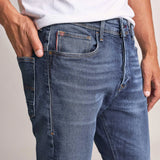 VAQUEROS KARL LOOSE SLIM CON DESGASTE - ECRU