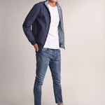 VAQUEROS KARL LOOSE SLIM CON DESGASTE - ECRU