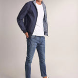 VAQUEROS KARL LOOSE SLIM CON DESGASTE - ECRU